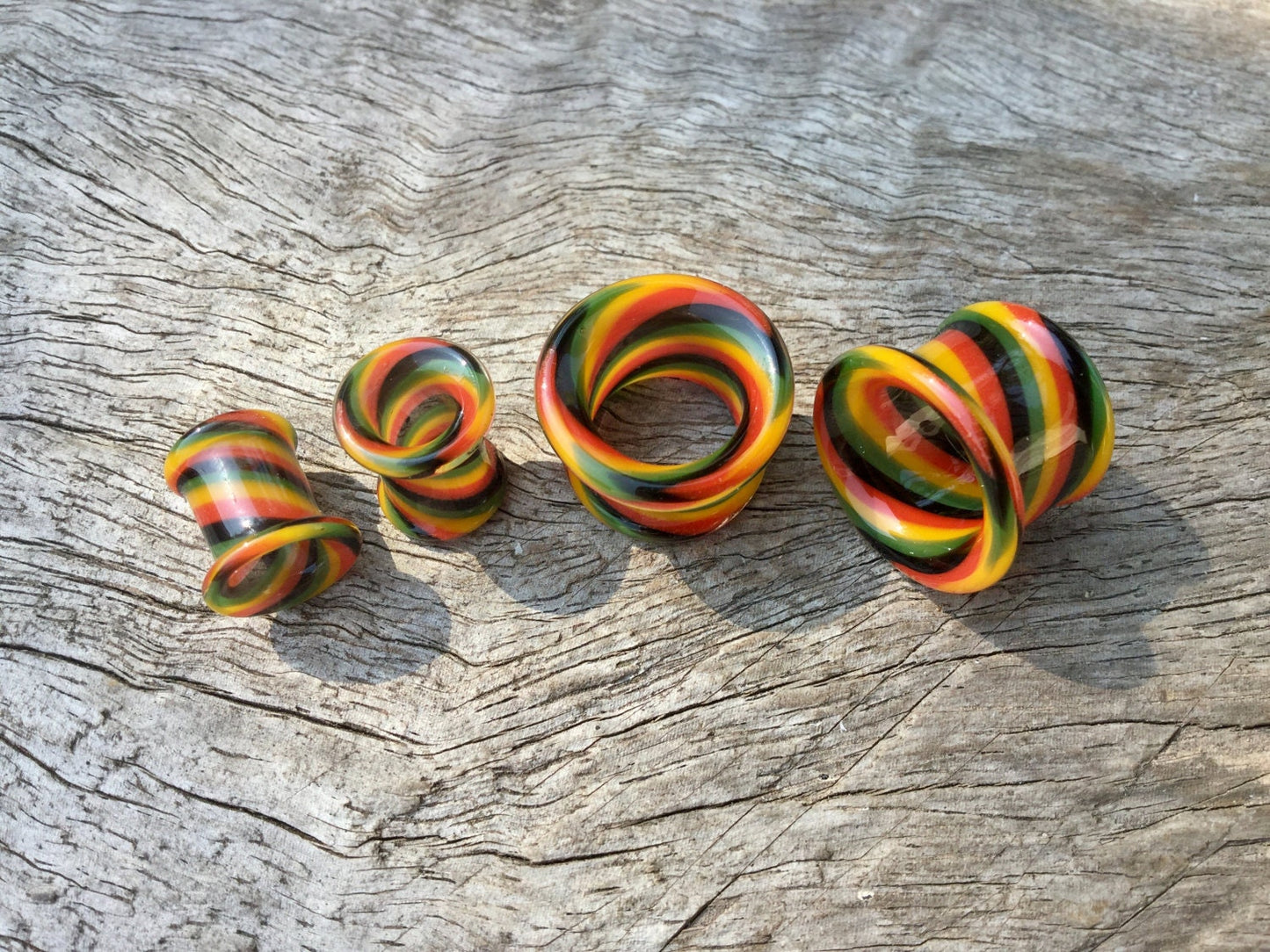 1 Pair (2 Pieces) Rasta Twist Tunnels Pyrex Glass Gauges