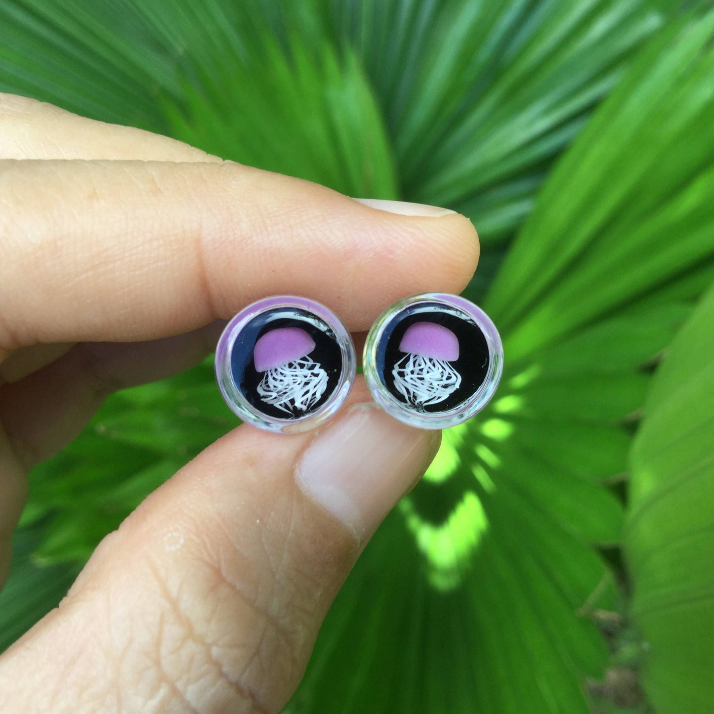 1 Pair (2 Pieces) Pyrex Glass Mauve Purple Jellyfish Plugs Black Background