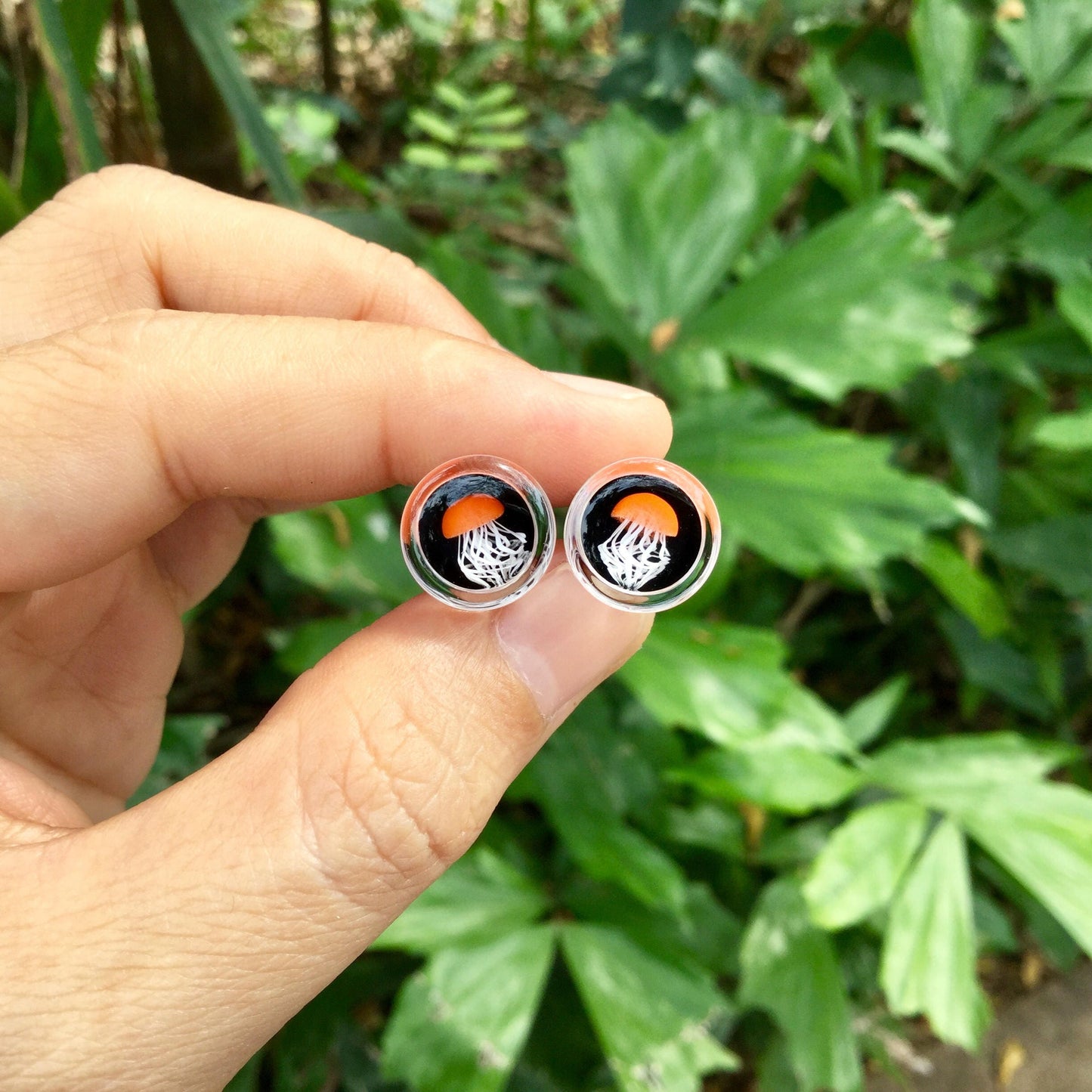 1 Pair (2 Pieces) Pyrex Glass Orange Jellyfish Plugs Black Background White Legs