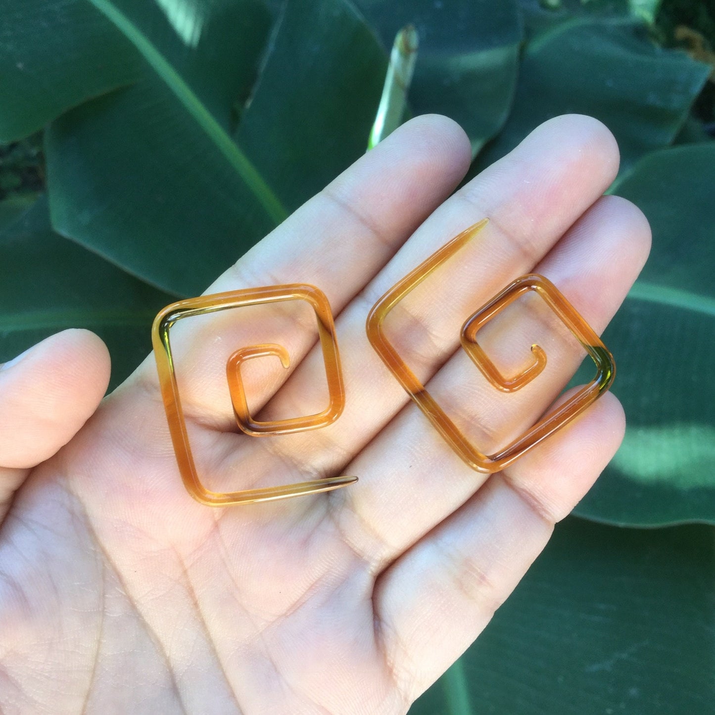 1 Pair (2 Pieces) Translucent Amber Colored Glass Square Spirals