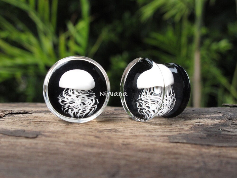 1 Pair (2 Pieces) Pyrex Glass White Jellyfish Plugs on Black Background