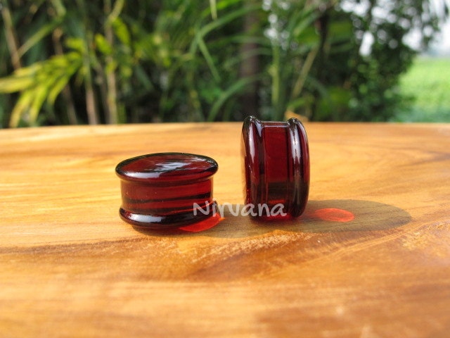 1 Pair (2 Pieces) Amber Colored Glass Plugs