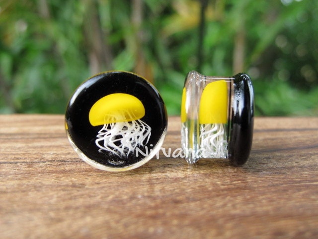 1 Pair (2 Pieces) Pyrex Glass Mustard Yellow Jellyfish Plugs Black Background