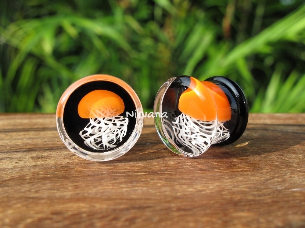 1 Pair (2 Pieces) Pyrex Glass Orange Jellyfish Plugs Black Background White Legs