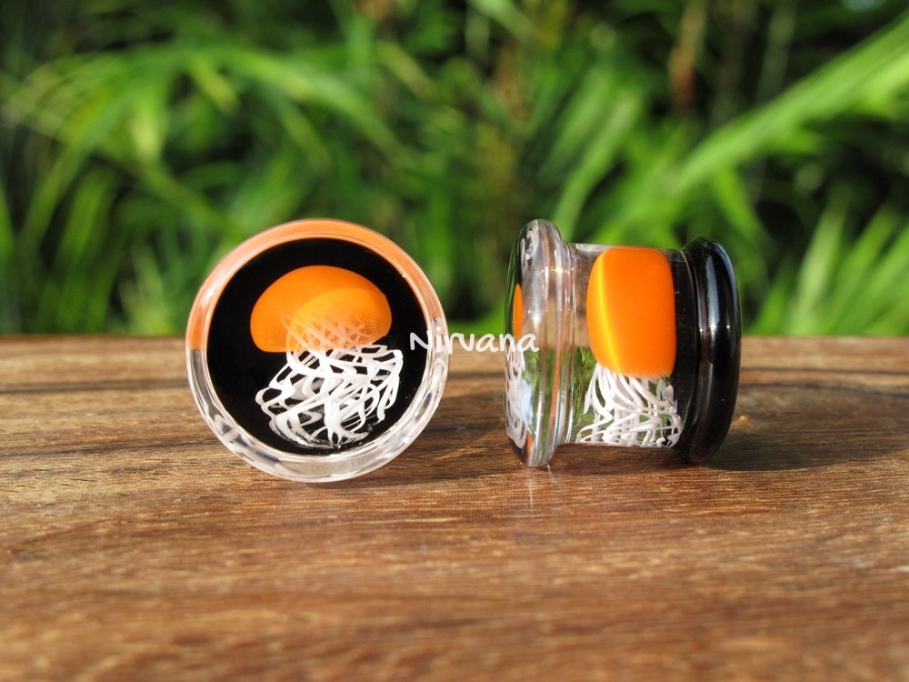 1 Pair (2 Pieces) Pyrex Glass Orange Jellyfish Plugs Black Background White Legs