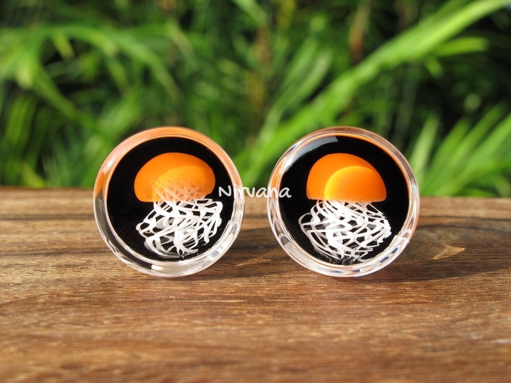 1 Pair (2 Pieces) Pyrex Glass Orange Jellyfish Plugs Black Background White Legs