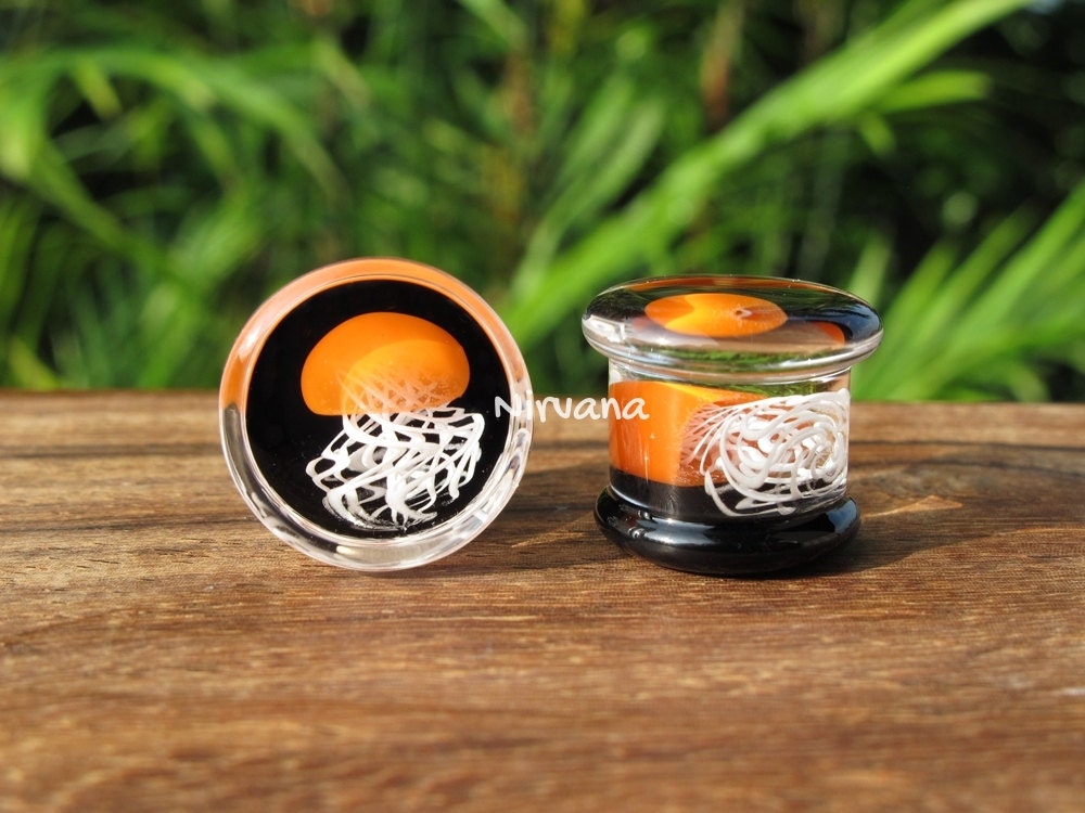 1 Pair (2 Pieces) Pyrex Glass Orange Jellyfish Plugs Black Background White Legs