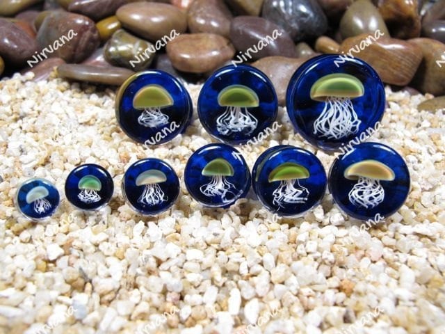1 Pair (2 Pieces) Pyrex Glass Jellyfish Plugs Black Background
