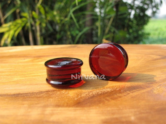 1 Pair (2 Pieces) Amber Colored Glass Plugs