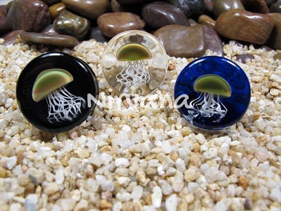 1 Pair (2 Pieces) Pyrex Glass Jellyfish Plugs Black Background